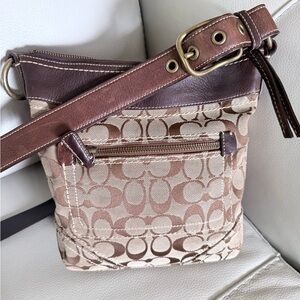 Coach leather/canvas Soho vintage Crossbody Bag. In signature jaguar.